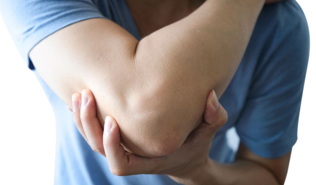 Chiropractor treating tennis elbow at District Wellness, Arlington, VA