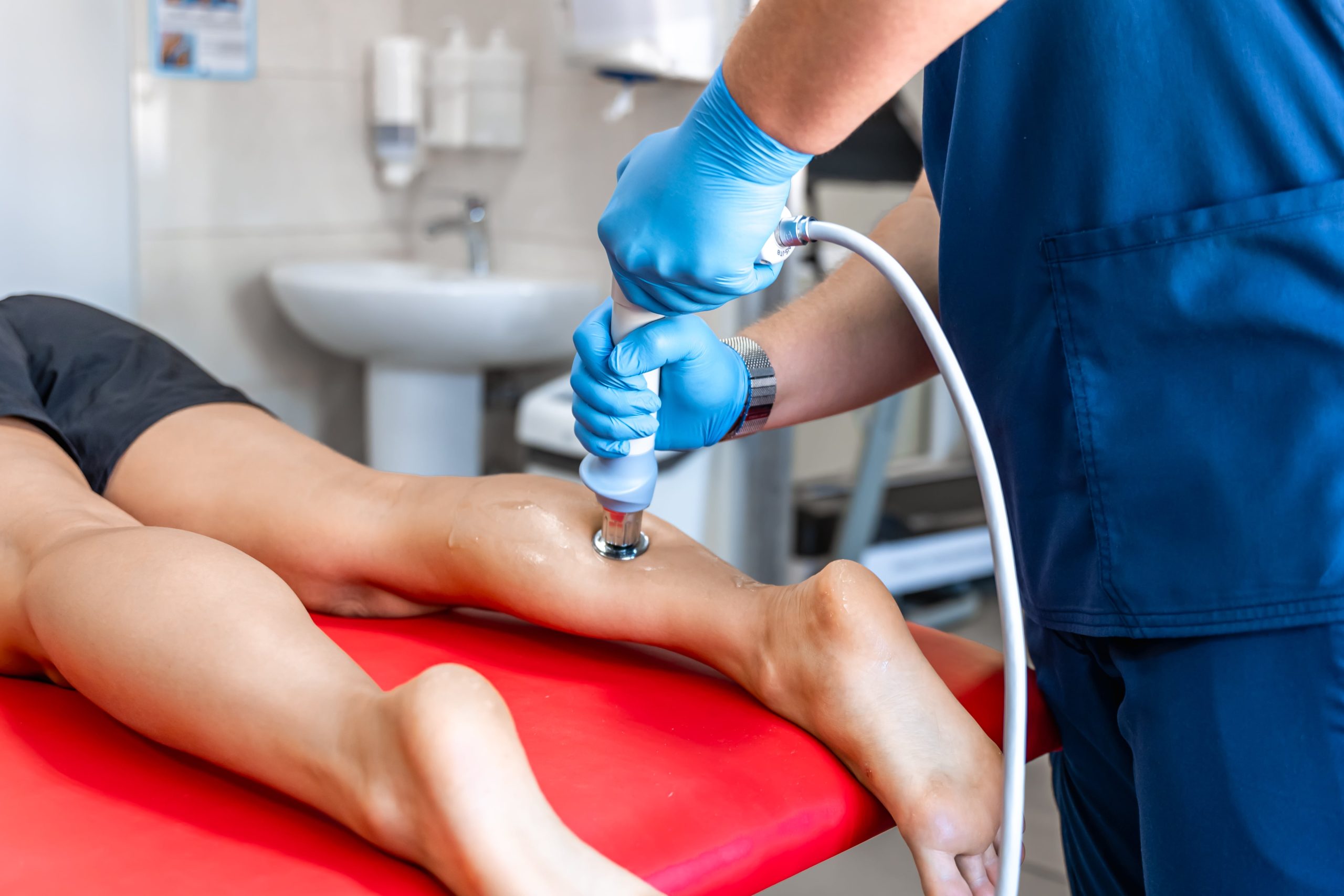 Shockwave therapy treatment being delivered at District Wellness, Arlington, VA